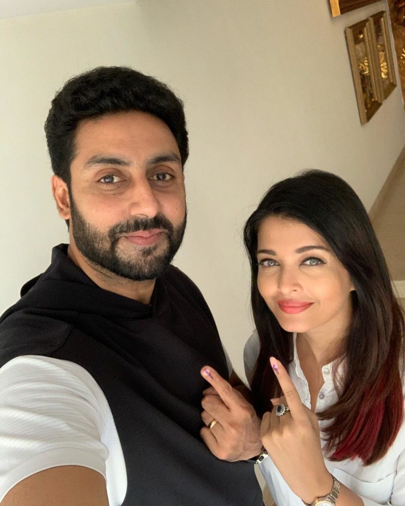 abhishek bachchan with wife aishwarya rai after doing election voting