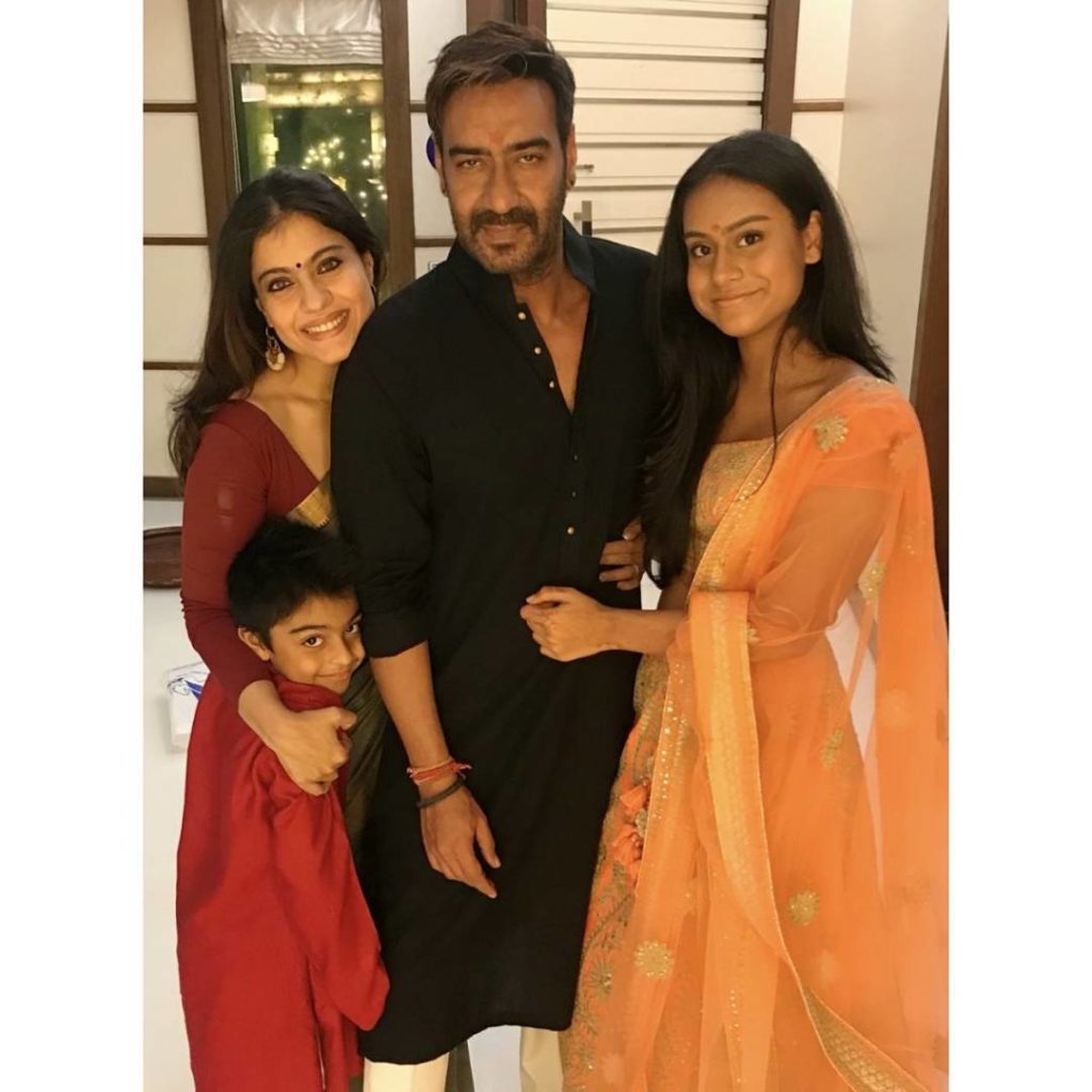 bollywood actor Ajay devgan complete family pic with wife Kajol daughter Nysa & son Yug