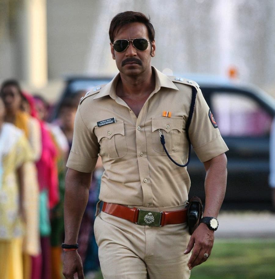 bollywood actor ajay devgan in Singham playing a power-packed action and the fearless character